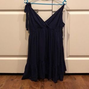 A gorgeous navy flowy tank top!